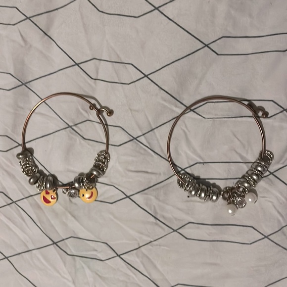 These are two lightly used bracelets. They come with beads that can be removed. - Picture 1 of 2